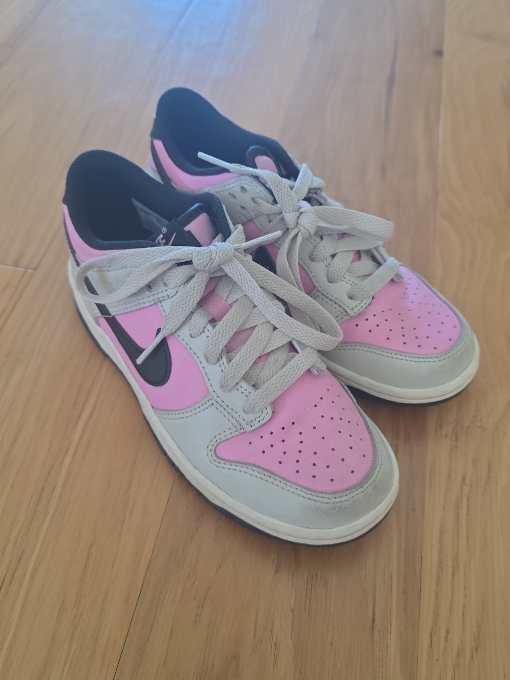 Nike Kids Pink and Gray Low-Top Sneakers with Black Swoosh